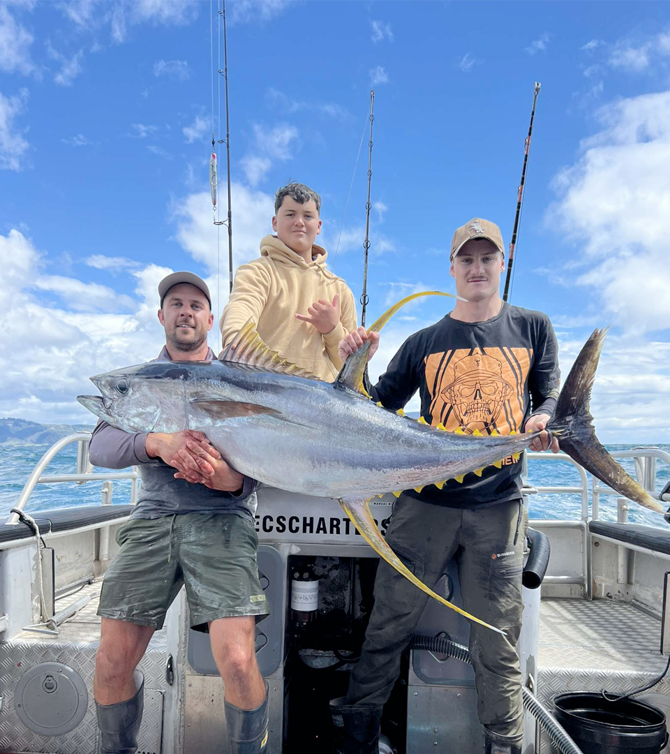 Image of men holding fish