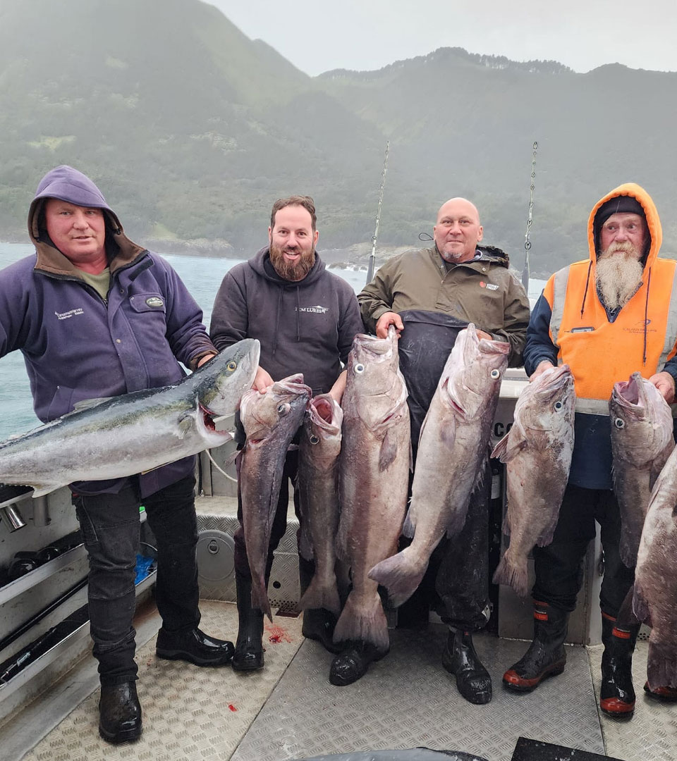 Image of men holding fish